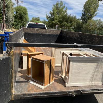 Cabinet and dresser boxes loaded for removal in West Hills