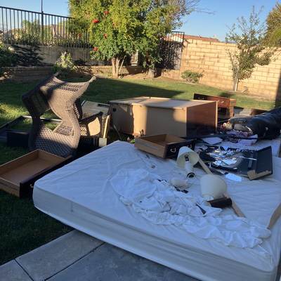Backyard furniture and mattress cleanout in West Hills